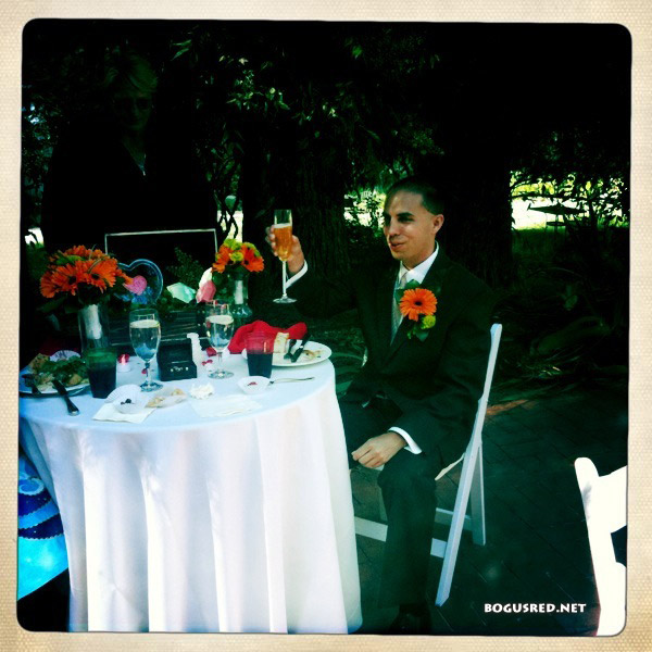 Mike cheers at sweetheart table